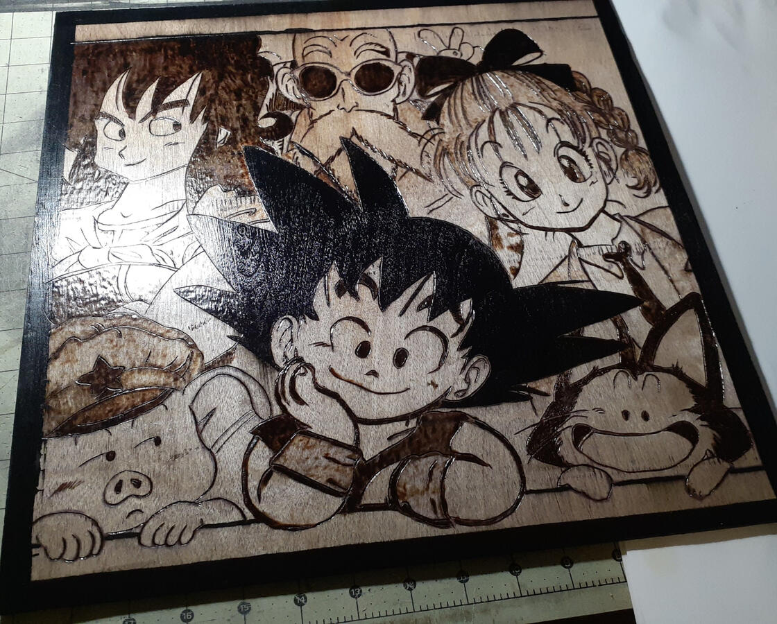 16x16" wood burning with color ink and poly finish